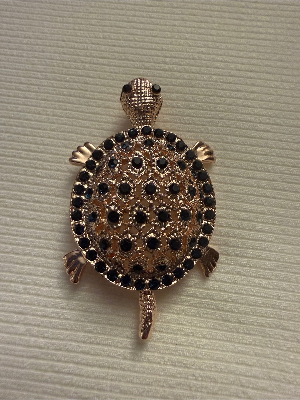Gold-Tone Turtle Brooch with Black Crystal Accents